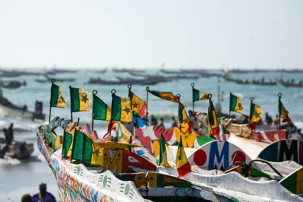 boats flying Senegalese flags in Kafountine
